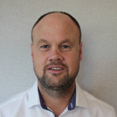 Headshot of Adam Hollis